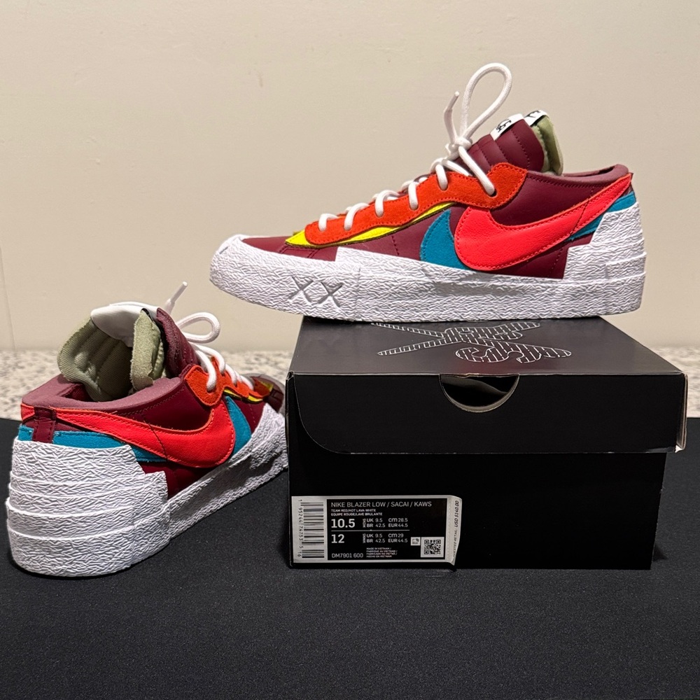 KAWS × sacai × Nike Blazer Low in “Team Red”